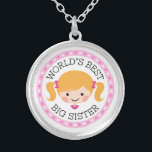 Worlds best big sister cartoon girl blonde hair silver plated necklace<br><div class="desc">Cute necklace featuring a little cartoon girl with blonde hair tied up in pigtails with pink bows. Text "World's best big sister". Around is a round,  pink border with polka dots. Also available in a version for little sisters.</div>