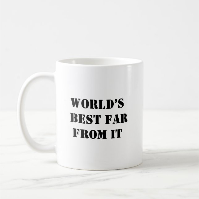 World's Best Far From It Funny Mug (Left)