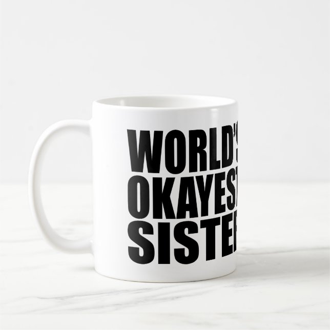 WORLD'S OKAYEST SISTER. COFFEE MUG (Left)