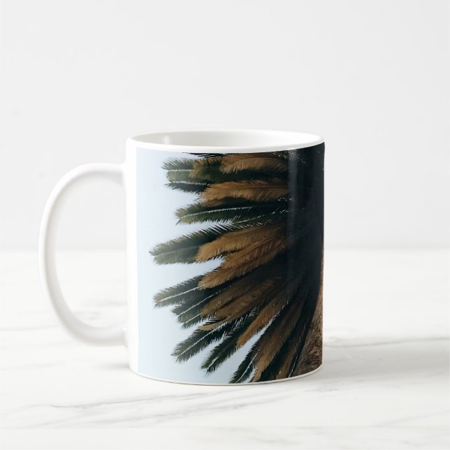 Worm eye photography of palm tree coffee mug (Left)