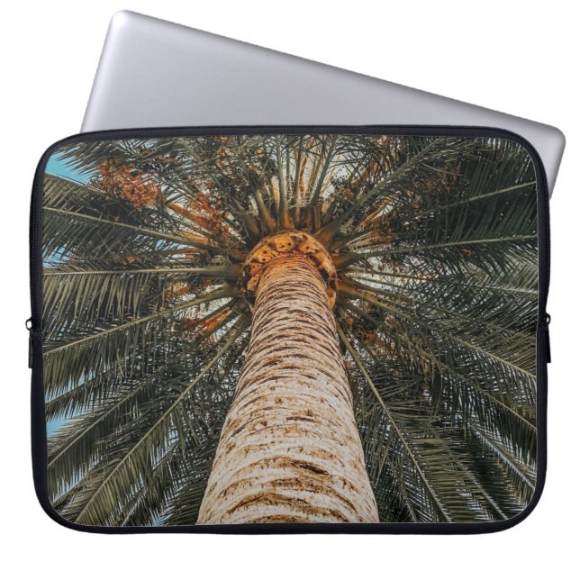 Worm's eye view of a coconut tree laptop sleeve (Front)