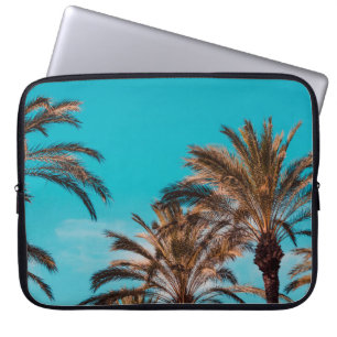 WORM'S EYE VIEW PHOTOGRAPHY OF BROWN TREES LAPTOP SLEEVE