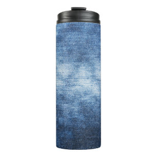 Worn denim fabric, textured background. thermal tumbler