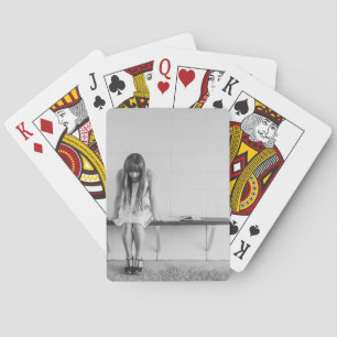 Worried Girl Playing Cards