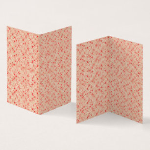 Wrapping paper with a repeating pattern of red, or