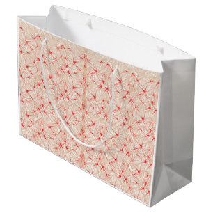Wrapping paper with a repeating pattern of red, or large gift bag