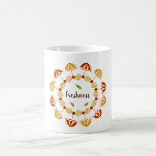 Wreath with slices of orange, cherries and summer coffee mug