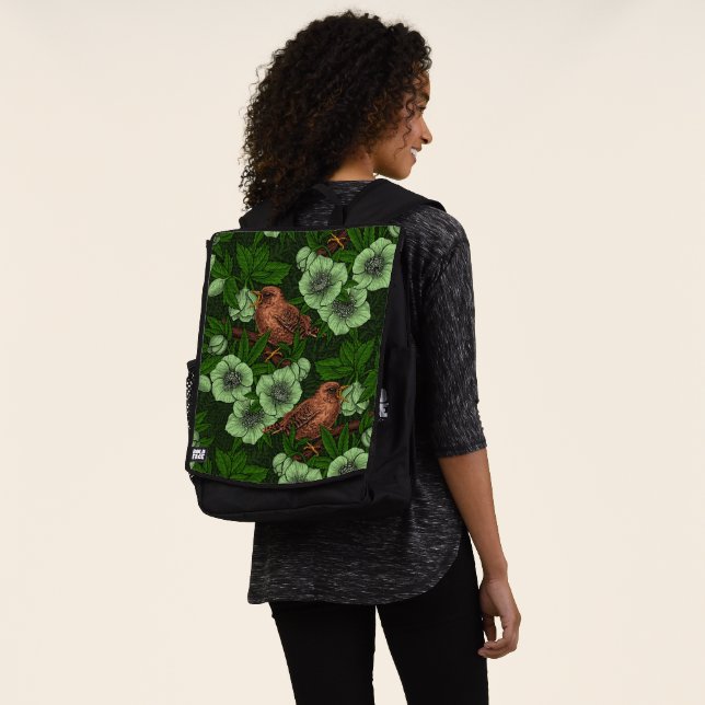 Wren and hellebore on dark green backpack (Worn)