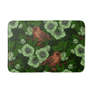 Wren and hellebore on dark green bath mat