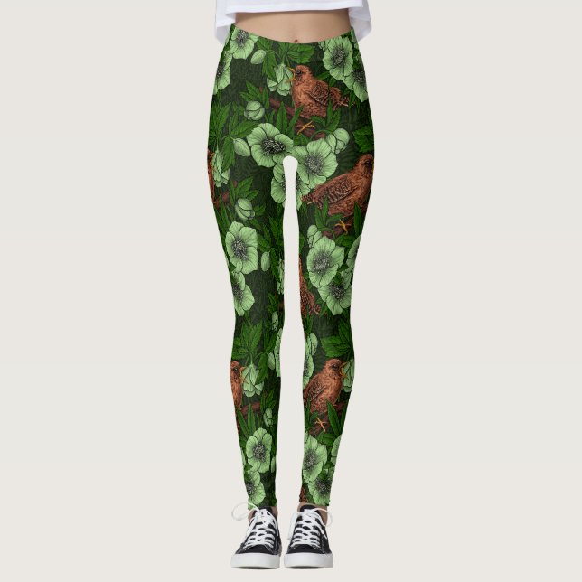 Wren and hellebore on dark green leggings (Front)
