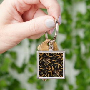 Wrens and acorns on black key ring