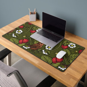 Wrens and strawberries on dark green desk mat