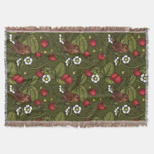 Wrens and strawberries on dark green throw blanket
