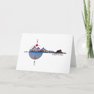 Wyoming mountains and compass card