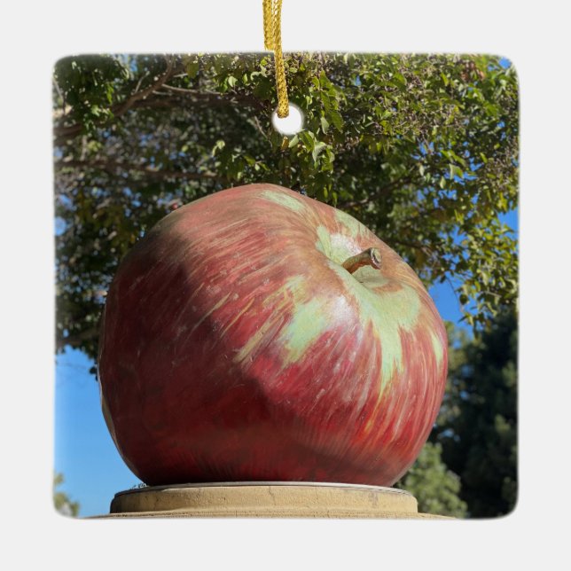 X.ITINERARIES: Giant Apple Ceramic Ornament (Front)
