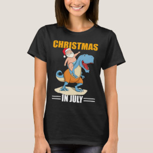 Xmas Dinosaur Summer Christmas In July Santa In Ju T-Shirt
