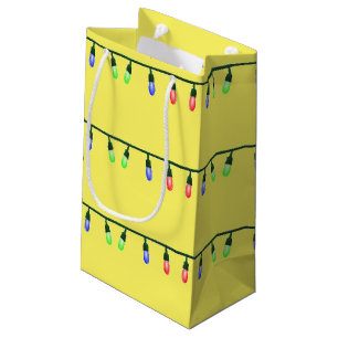 Xmas lights on yellow small gift bag
