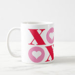 xoxo valentine's day mug<br><div class="desc">This valentine's day mug features alternating red and pink xoxo type with white hearts in the centre of the O's on a white ceramic mug.</div>