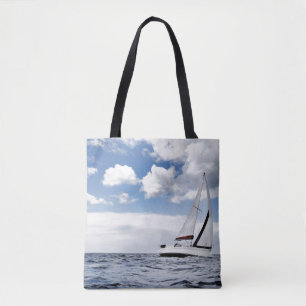 Yacht Sailing In Open Sea Tote Bag