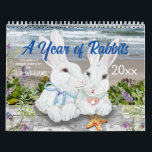 Year of Rabbit Bunny Cute Nature Woodland Art Calendar<br><div class="desc">This whimsical calendar celebrates rabbits with 12 colourful artistic scenes of cute bunny rabbit couples enjoying each month's festivities. Perfect for the Year of the Rabbit, 2023! Snuggle bunny companions in winter snow, in flower gardens, in woodland settings, enjoying time at the sea coast, in a pumpkin patch, and in...</div>