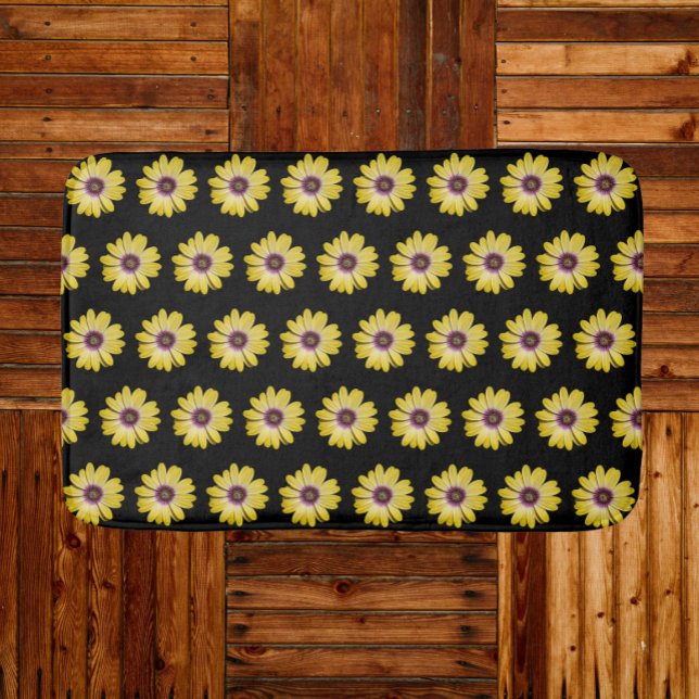 Yellow African Daisy Floral Pattern on Black Bath Mat (In Situ)