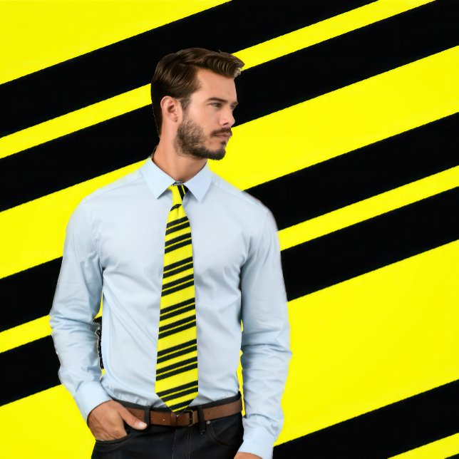 Yellow and Black Diagonal Striped Tie (Man wears a necktie with a classic pattern of black stripes on yellow.)