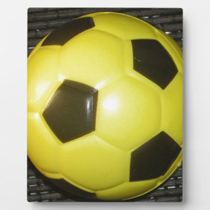 Yellow and black Football. Plaque