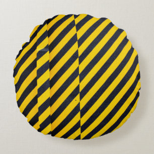 Yellow and black striped textile round cushion