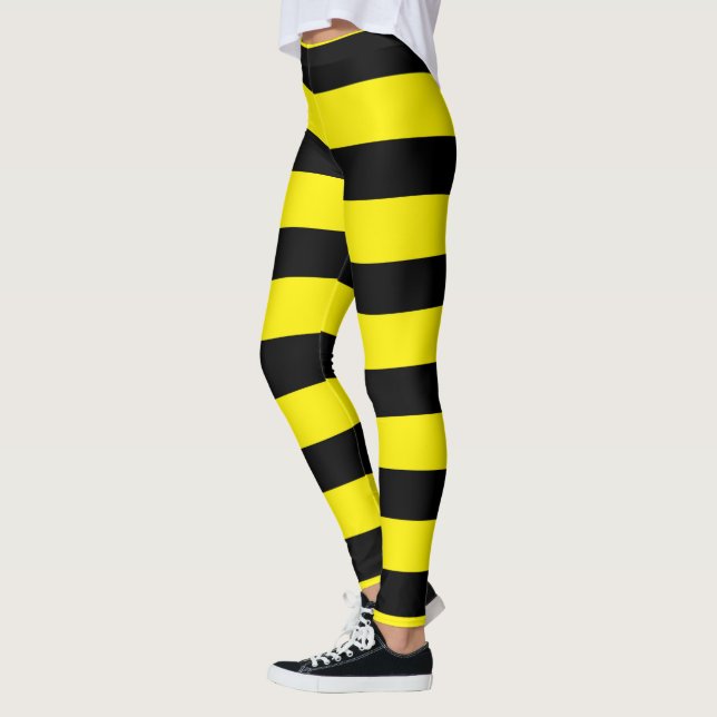 Yellow and black vertical stripes patterned leggings (Left)