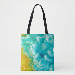 Yellow and blue abstract paint splash backgroundab tote bag