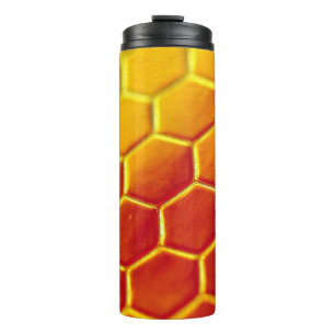 Yellow and brown floor tiles thermal tumbler