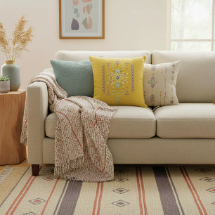Yellow and green tribal design cushion