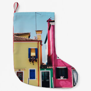 YELLOW AND PINK CONCRETE HOUSES DURING DAYTIME SMALL CHRISTMAS STOCKING