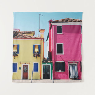 YELLOW AND PINK CONCRETE HOUSES DURING DAYTIME TAPESTRY