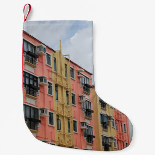 YELLOW AND RED CONCRETE BUILDING UNDER WHITE CLOUD SMALL CHRISTMAS STOCKING