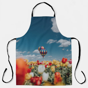 Yellow and red tulip flowers under hot air balloon apron