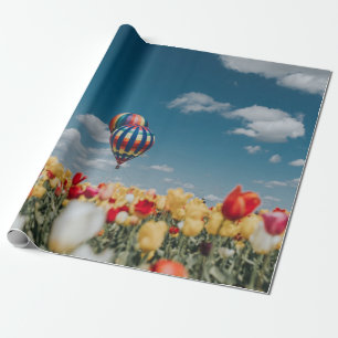 Yellow and red tulip flowers under hot air balloon wrapping paper