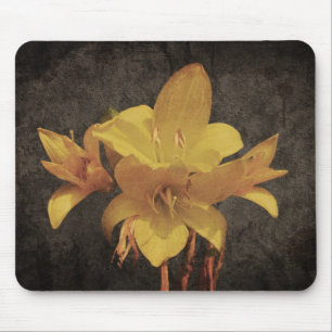 Yellow Asiatic lily on old grunged canvas backgrou Mouse Pad