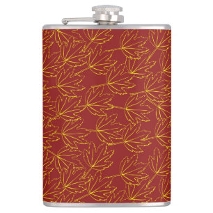 yellow autumn leaves pattern on brown hip flask