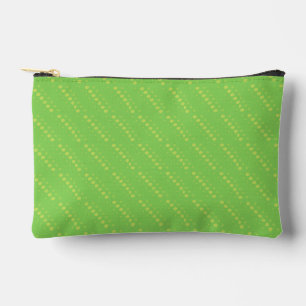 Yellow balls on green accessory pouch
