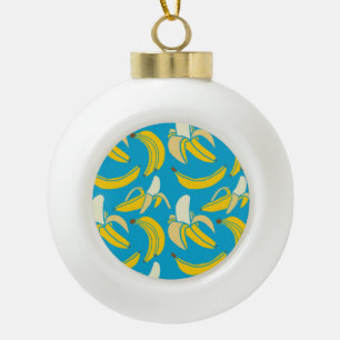 Yellow bananas, blue background pattern ceramic ball christmas ornament