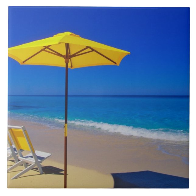 Yellow beach umbrella and chairs on pristine ceramic tile (Front)