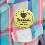Yellow Black High School Graduate Custom Name Tag 6 Cm Round Badge<br><div class="desc">This modern yellow and black custom senior graduate button features classy white typography of your high school or college name for the class of 2025. Customise with your graduating year under the chic black handwritten script and black grad cap for a great personalised graduation name tag for a party or...</div>