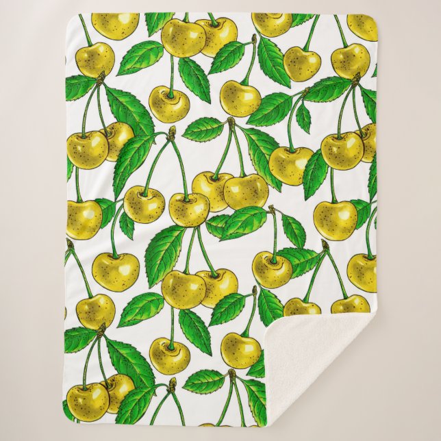 Yellow cherries on white sherpa blanket (Front)