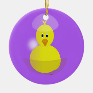 Yellow chick on purple ceramic ornament