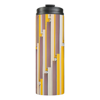 YELLOW CONCRETE BUILDING DURING DAYTIME THERMAL TUMBLER