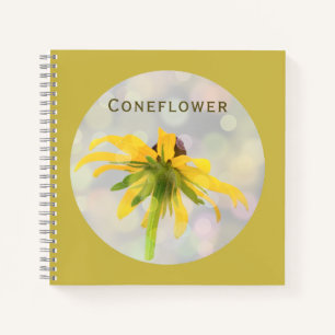Yellow Coneflower on Old Gold Notebook