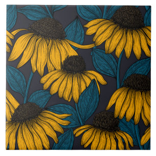 Yellow coneflowers on dark blue ceramic tile