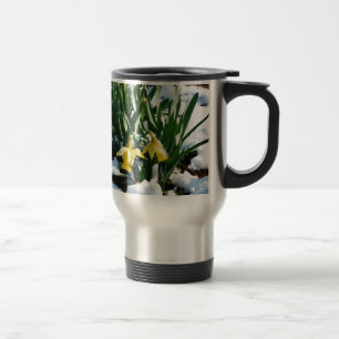Yellow Daffodils flowers in the snow Travel Mug