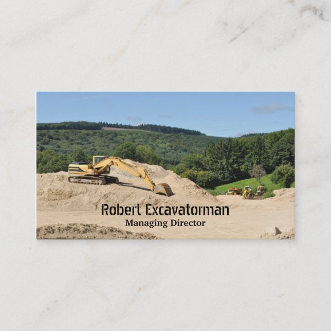 Yellow excavator on a building site business card (Front)